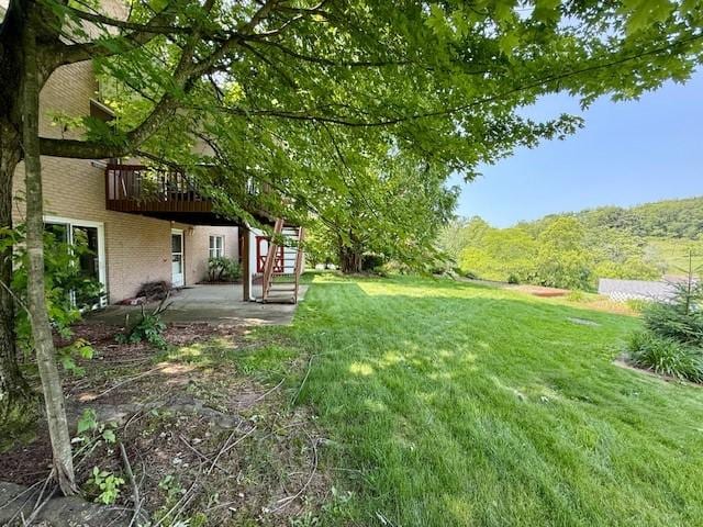 116 Valleycrest Dr, Cecil, PA 15321 - view of grassy yard featuring a patio area and a wooden deck