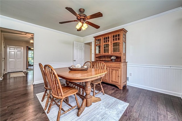 108 Vanita Dr, Moon/Crescent Twp, PA 15108 - dining area with dark wood-type flooring, a ceiling fan, a wainscoted wall, and ornamental molding