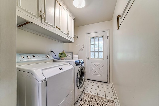 108 Vanita Dr, Moon/Crescent Twp, PA 15108 - laundry room featuring cabinet space, washer and clothes dryer, light tile patterned flooring, and baseboards