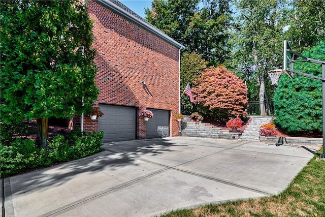 510 Fair Vista Ct, Pine Twp Nal, PA 15090 - view of home's exterior with brick siding, a garage, and concrete driveway