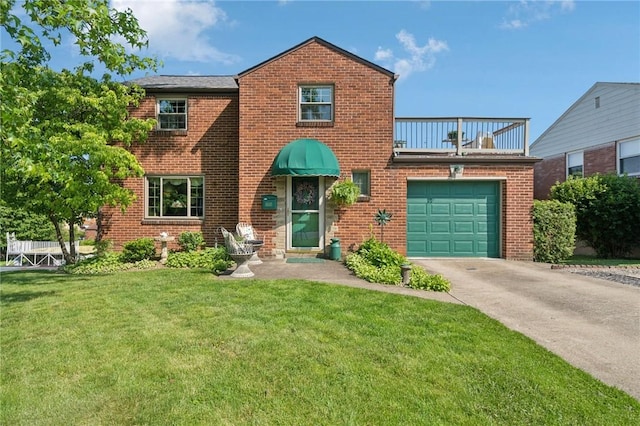 4335 Frank St, Whitehall, PA 15227 - view of front facade featuring a garage, brick siding, a front yard, and driveway