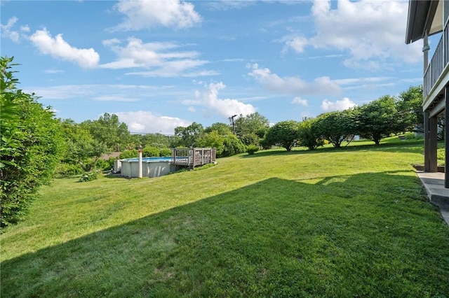 4335 Frank St, Whitehall, PA 15227 - view of green lawn with an outdoor pool