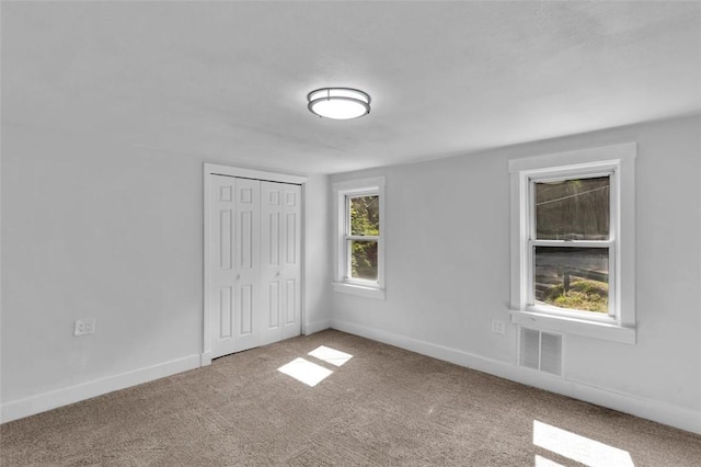 8536 Pershing St, Penn Hills, PA 15235 - unfurnished bedroom featuring carpet, baseboards, and a closet