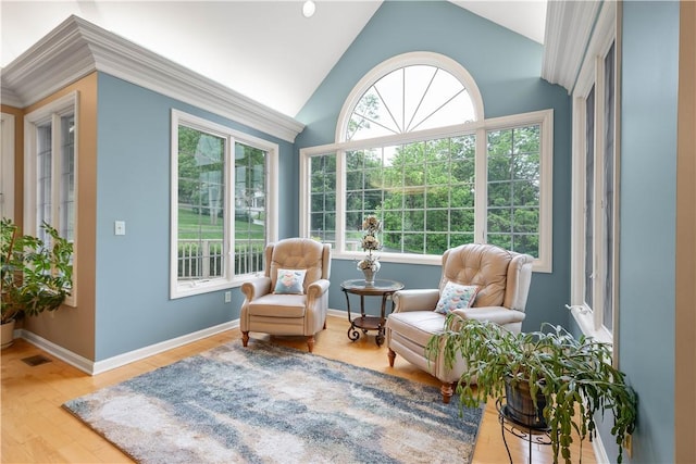221 Red Oak Dr, Peters Twp, PA 15317 - living area with wood finished floors, vaulted ceiling, and baseboards