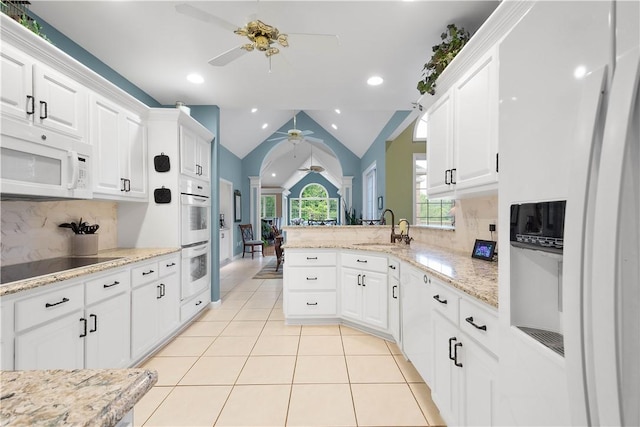 221 Red Oak Dr, Peters Twp, PA 15317 - kitchen with a ceiling fan, white appliances, a sink, light tile patterned floors, and tasteful backsplash
