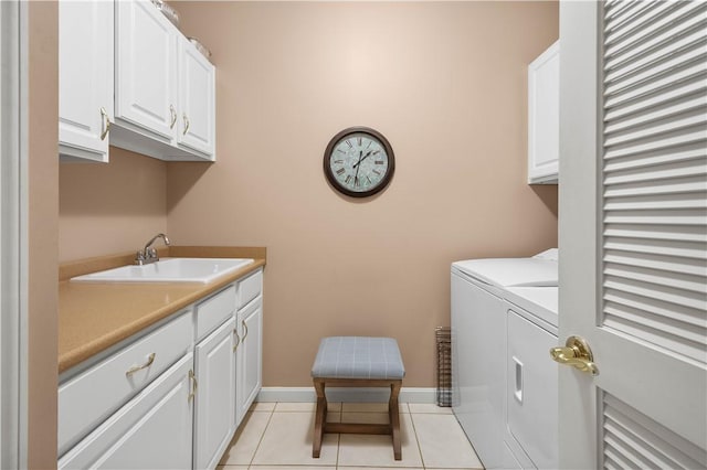 221 Red Oak Dr, Peters Twp, PA 15317 - washroom featuring cabinet space, washer and clothes dryer, light tile patterned floors, and baseboards