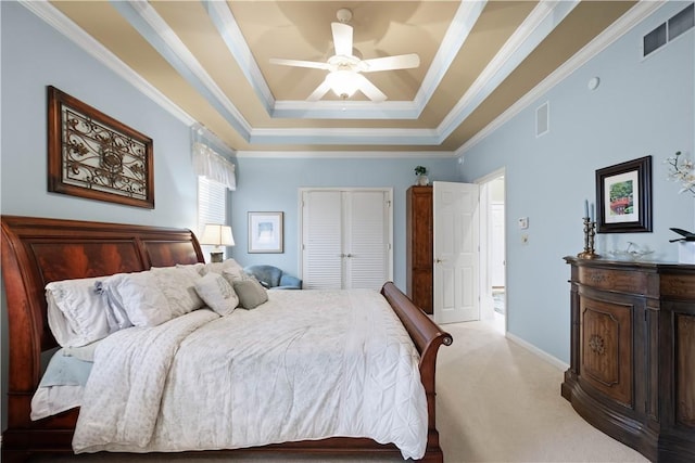 221 Red Oak Dr, Peters Twp, PA 15317 - bedroom featuring crown molding, light carpet, a closet, a ceiling fan, and a tray ceiling