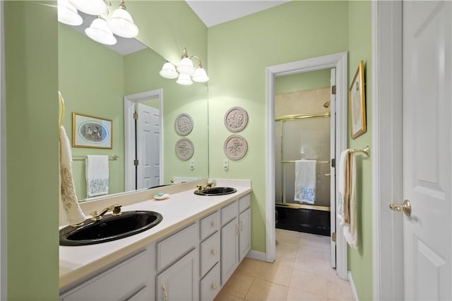 221 Red Oak Dr, Peters Twp, PA 15317 - bathroom with tile patterned flooring, a shower with door, double vanity, a chandelier, and baseboards