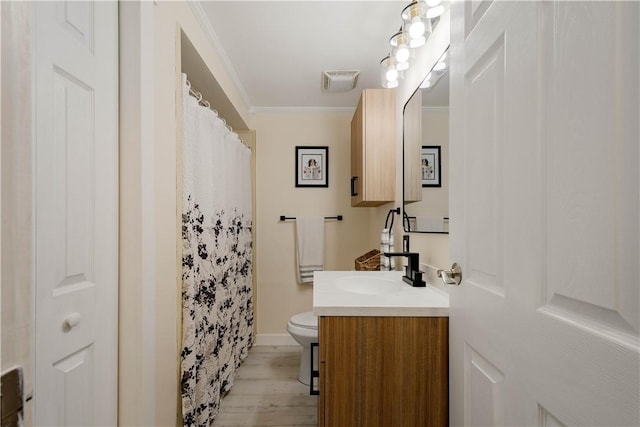 25 Rolling Rd, Cranberry Twp, PA 16066 - full bathroom featuring ornamental molding, vanity, wood finished floors, toilet, and baseboards