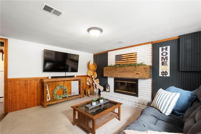 25 Rolling Rd, Cranberry Twp, PA 16066 - carpeted living area with wooden walls, a wainscoted wall, and a fireplace