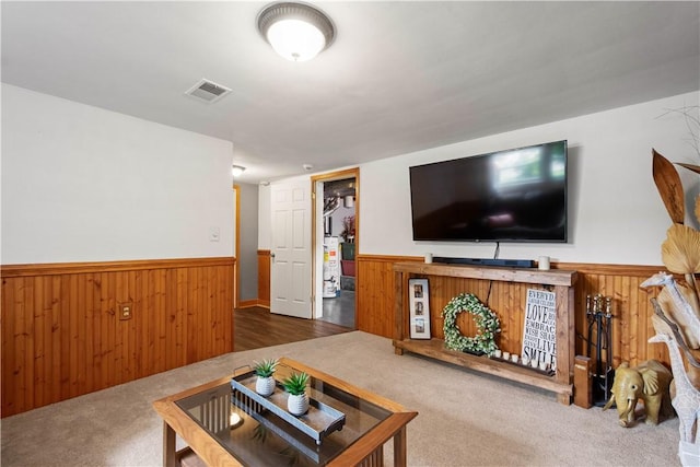 25 Rolling Rd, Cranberry Twp, PA 16066 - living area featuring a wainscoted wall, wood walls, and carpet