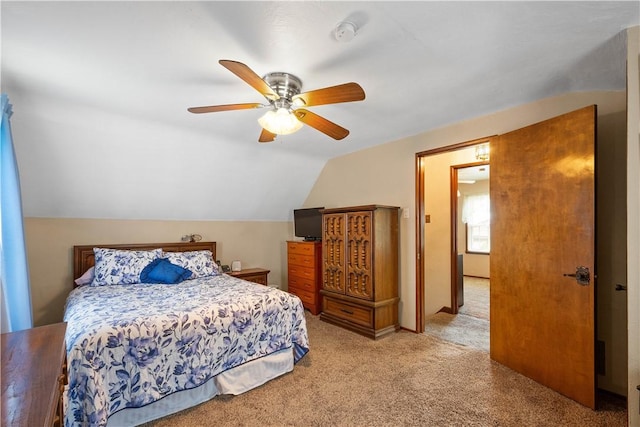 711 Ascension Dr W, West Mifflin, PA 15122 - bedroom featuring light colored carpet, vaulted ceiling, and a ceiling fan