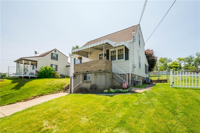 711 Ascension Dr W, West Mifflin, PA 15122 - back of property featuring stairway, central AC unit, and roof with shingles