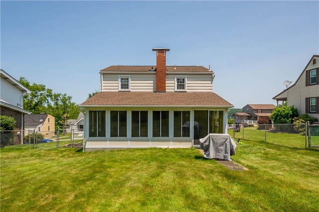 711 Ascension Dr W, West Mifflin, PA 15122 - rear view of house with a sunroom, a chimney, and a shingled roof