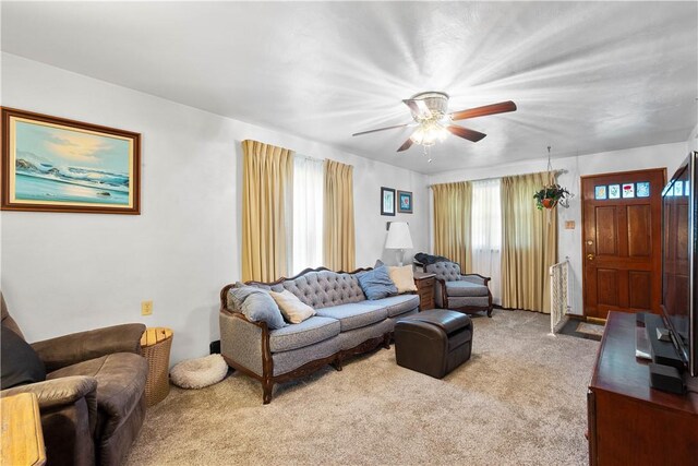 711 Ascension Dr W, West Mifflin, PA 15122 - living room featuring light colored carpet and a ceiling fan