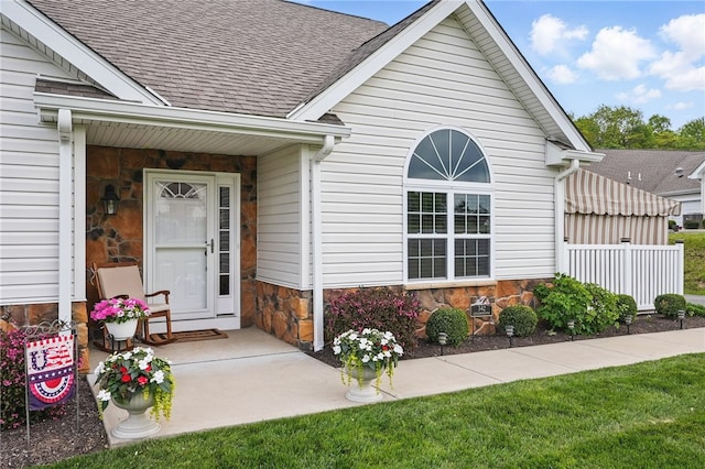 342 Saddlebrook Rd, West Deer, PA 15044 - doorway to property featuring stone siding and a shingled roof