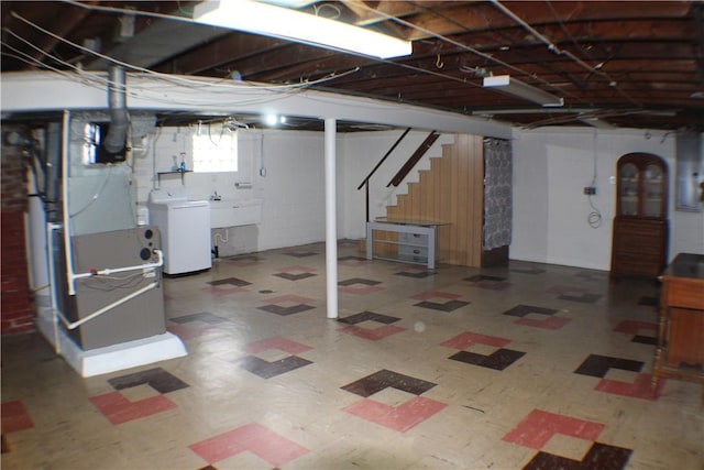 84 Pennsylvania Ave, Monessen, PA 15062 - basement featuring washer / clothes dryer, tile patterned floors, and stairs
