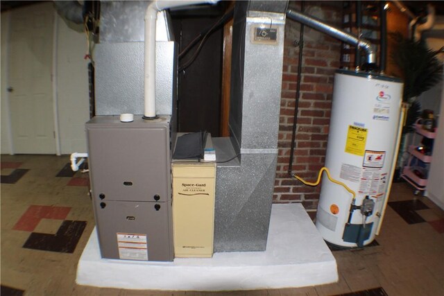 84 Pennsylvania Ave, Monessen, PA 15062 - utility room with gas water heater and heating unit
