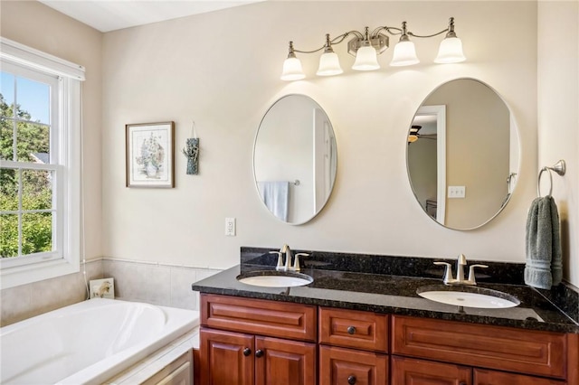 91 Shenot Rd, Marshall, PA 15090 - full bathroom with healthy amount of natural light, double vanity, a bath, and a ceiling fan
