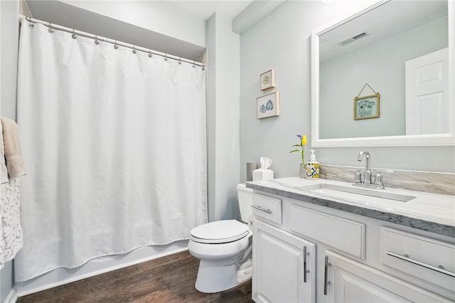 123 Ashley Hill Dr, Mccandless, PA 15090 - bathroom with vanity, wood finished floors, toilet, and shower / bath combo with shower curtain