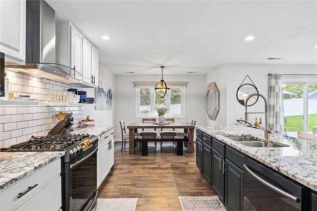 123 Ashley Hill Dr, Mccandless, PA 15090 - kitchen featuring black appliances, wall chimney range hood, a sink, white cabinetry, and recessed lighting