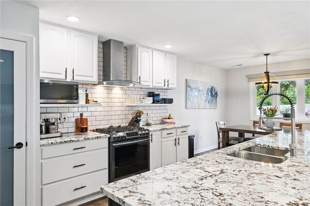 123 Ashley Hill Dr, Mccandless, PA 15090 - kitchen with wall chimney range hood, stainless steel appliances, backsplash, baseboards, and white cabinetry