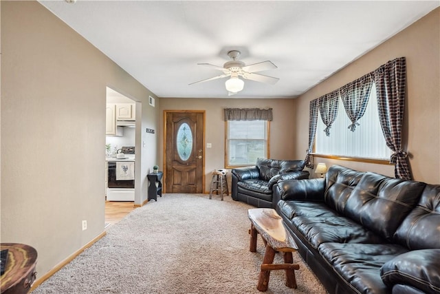 829 Hecla Rd, Mount Pleasant Twp Wml, PA 15666 - living area featuring light carpet, ceiling fan, and baseboards