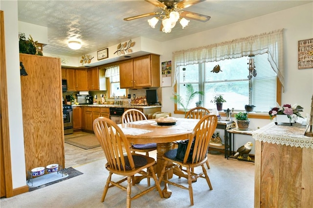 3062 Longview Rd, Hermitage, PA 16148 - dining area featuring a ceiling fan and light carpet