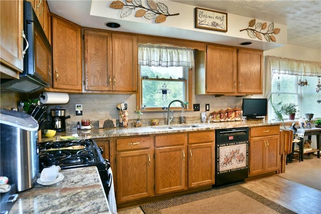3062 Longview Rd, Hermitage, PA 16148 - kitchen featuring dishwashing machine, a sink, brown cabinets, tasteful backsplash, and a textured ceiling