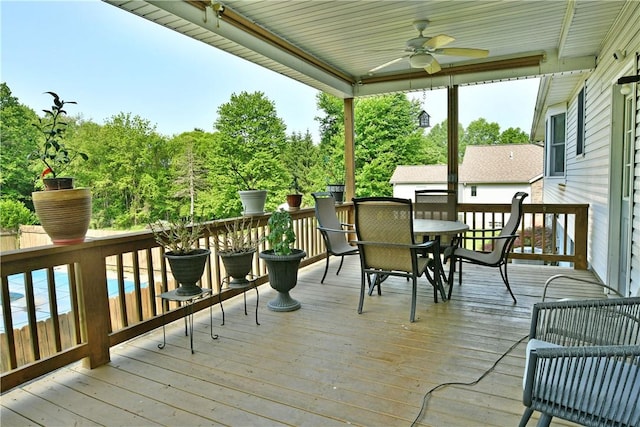 3062 Longview Rd, Hermitage, PA 16148 - wooden deck featuring outdoor dining space and ceiling fan