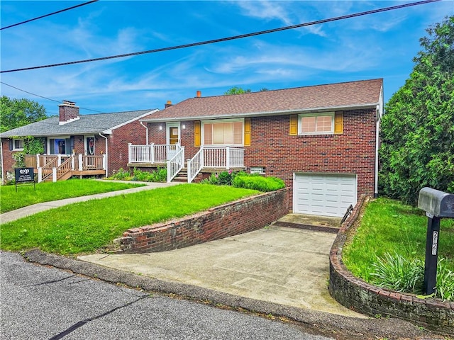 2828 School St, Harmony Twp Bea, PA 15003 - ranch-style house featuring driveway, brick siding, an attached garage, and a front yard