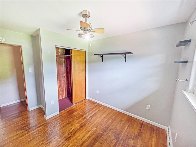 2828 School St, Harmony Twp Bea, PA 15003 - unfurnished bedroom featuring wood finished floors, a closet, baseboards, and ceiling fan