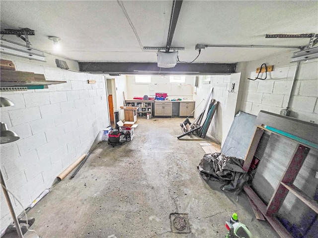 2828 School St, Harmony Twp Bea, PA 15003 - garage with concrete block wall and a garage door opener