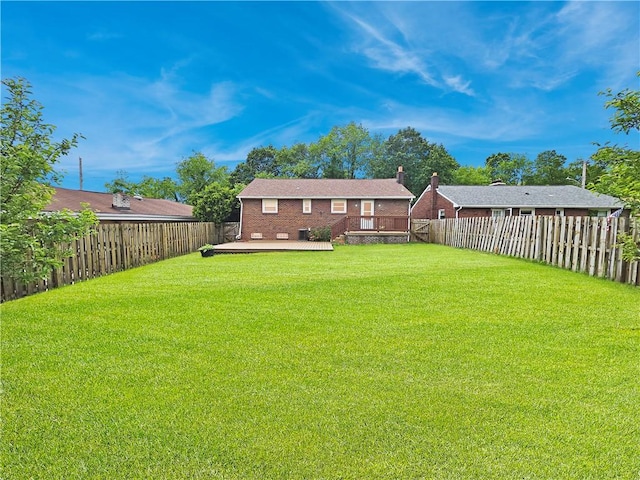 2828 School St, Harmony Twp Bea, PA 15003 - rear view of house with a deck and brick siding