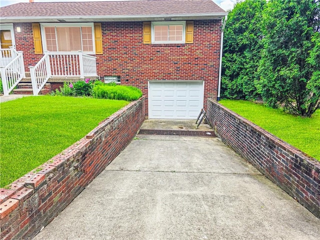 2828 School St, Harmony Twp Bea, PA 15003 - view of front of home featuring concrete driveway, a garage, a front lawn, and brick siding