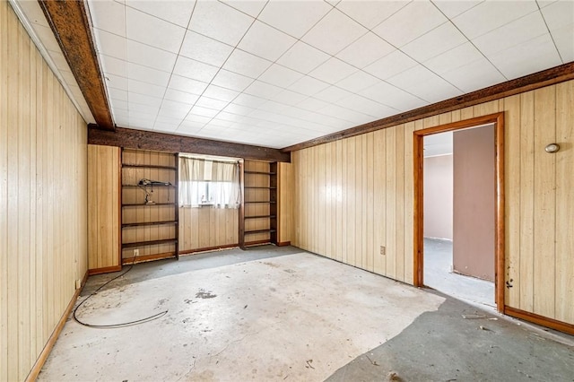 308 Cypress St, Rostraver, PA 15089 - unfurnished room featuring concrete floors and wood walls
