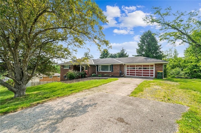 308 Cypress St, Rostraver, PA 15089 - single story home featuring an attached garage, brick siding, and driveway