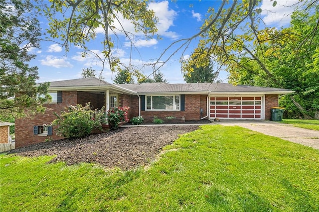 308 Cypress St, Rostraver, PA 15089 - ranch-style house featuring a garage, driveway, brick siding, and a front lawn