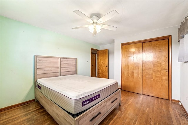 308 Cypress St, Rostraver, PA 15089 - bedroom with wood finished floors, a closet, baseboards, and a ceiling fan