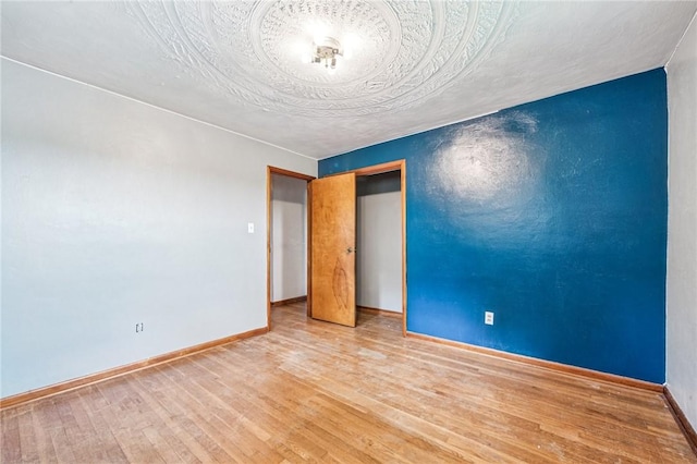 308 Cypress St, Rostraver, PA 15089 - unfurnished room with wood finished floors and baseboards