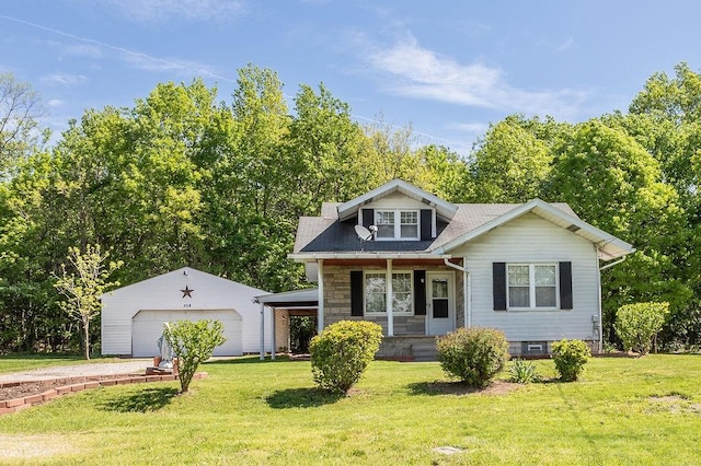 508 Meadow St, North Union Twp, PA 15401 - view of front of house with a detached garage, an outdoor structure, a porch, and a front lawn