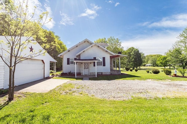 508 Meadow St, North Union Twp, PA 15401 - view of front facade featuring a front lawn, driveway, an outdoor structure, and a garage