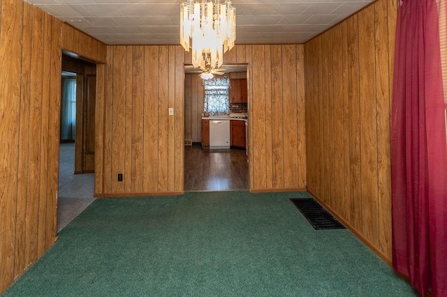 508 Meadow St, North Union Twp, PA 15401 - spare room featuring carpet flooring, wooden walls, and a chandelier