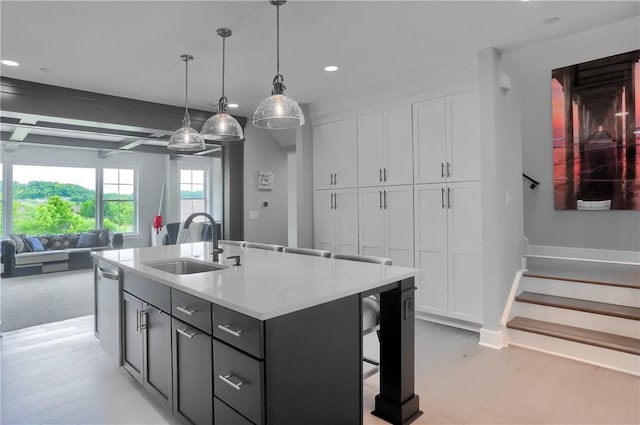 302 Highpointe Dr, Seven Fields Boro, PA 16046 - kitchen with recessed lighting, white cabinetry, an island with sink, light countertops, and open floor plan