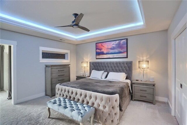 302 Highpointe Dr, Seven Fields Boro, PA 16046 - carpeted bedroom with a tray ceiling, a ceiling fan, and a closet