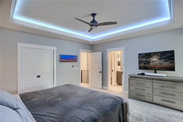 302 Highpointe Dr, Seven Fields Boro, PA 16046 - bedroom featuring a tray ceiling, light colored carpet, a ceiling fan, a closet, and connected bathroom