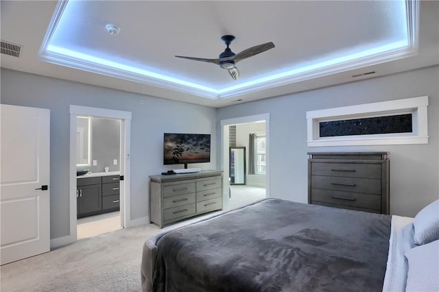 302 Highpointe Dr, Seven Fields Boro, PA 16046 - bedroom featuring a raised ceiling, light carpet, connected bathroom, and ceiling fan