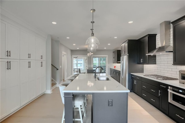 302 Highpointe Dr, Seven Fields Boro, PA 16046 - kitchen with wall chimney range hood, appliances with stainless steel finishes, dark cabinetry, backsplash, and recessed lighting