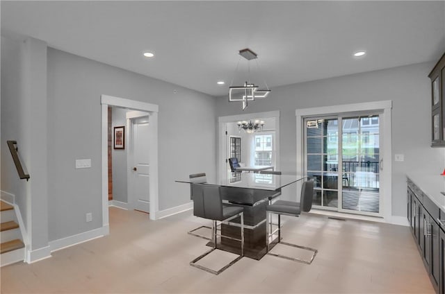 302 Highpointe Dr, Seven Fields Boro, PA 16046 - dining area featuring a chandelier, recessed lighting, and stairs