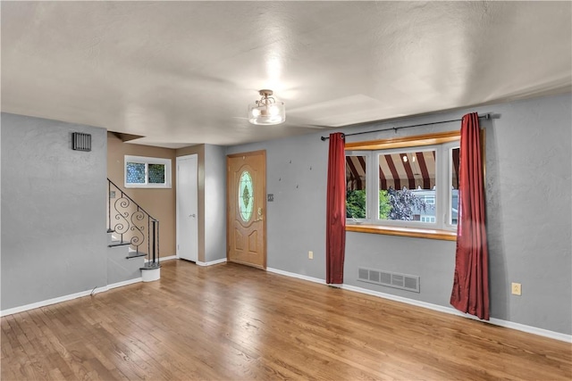 2389 High Oak Dr, Banksville/Westwood, PA 15220 - entrance foyer featuring wood finished floors, stairs, and baseboards
